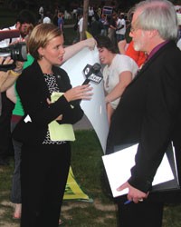 Sara Wojcicki, a reporter for WICS-TV (Chanel 20), interviews Rich Whitney