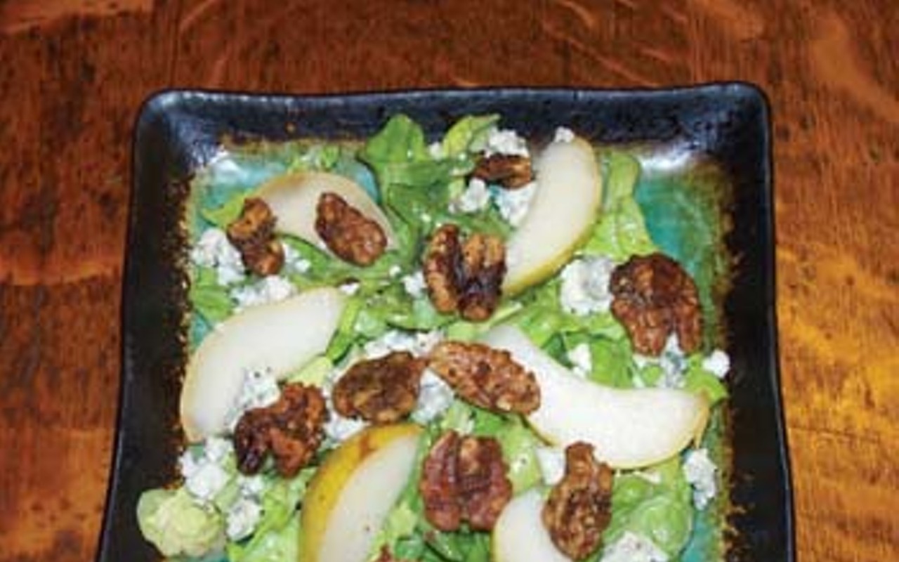 Salad with pears, blue cheese, salt and pepper caramelized walnuts, and sherry honey dressing