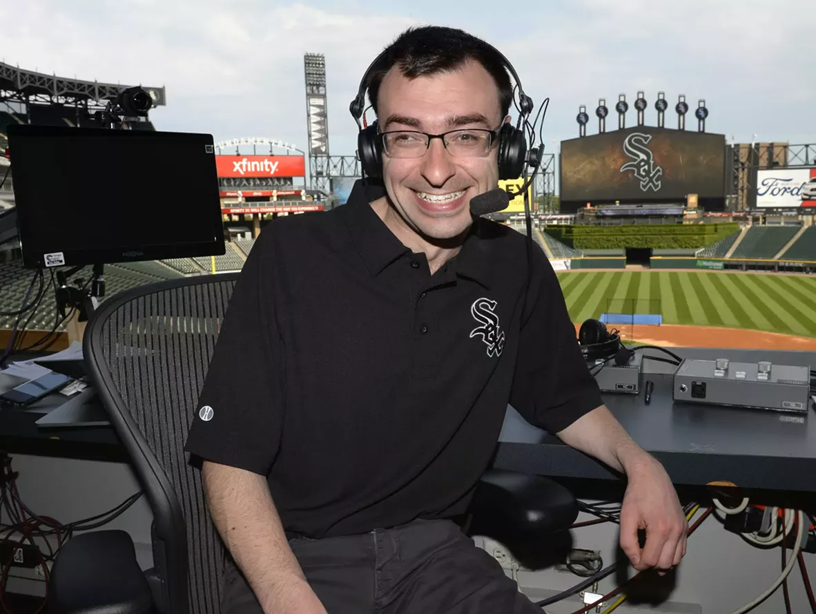 Jason Benetti in the broadcast booth preparing for a Chicago White Sox broadcast