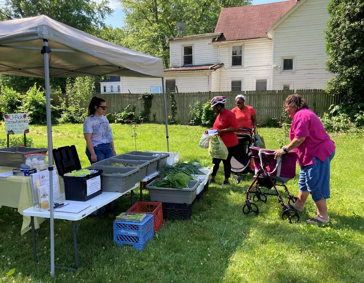Volunteers from SIU staff the Free Farmers Market
